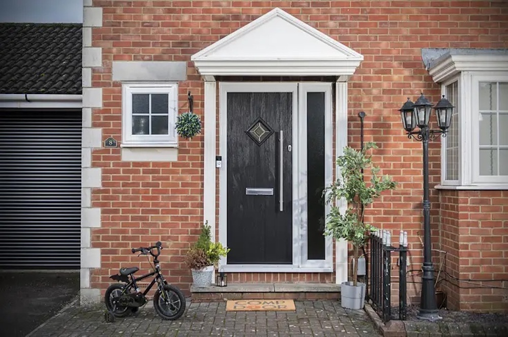 Low maintenance composite door with durable finish